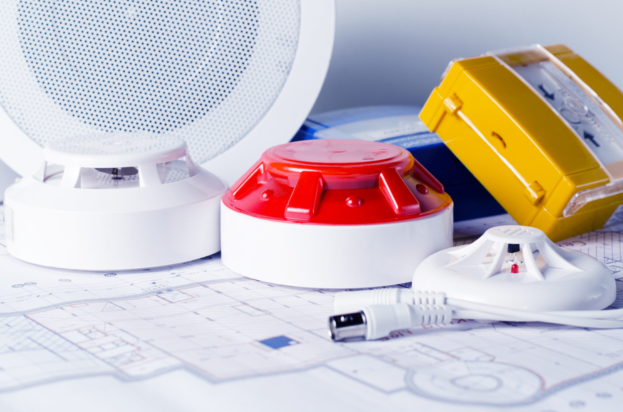 Fire protection equipment sitting on blueprints | Featured image for Appliance Servicing and Repair - Restricted Electrical Licensing Course by Get Skilled Training