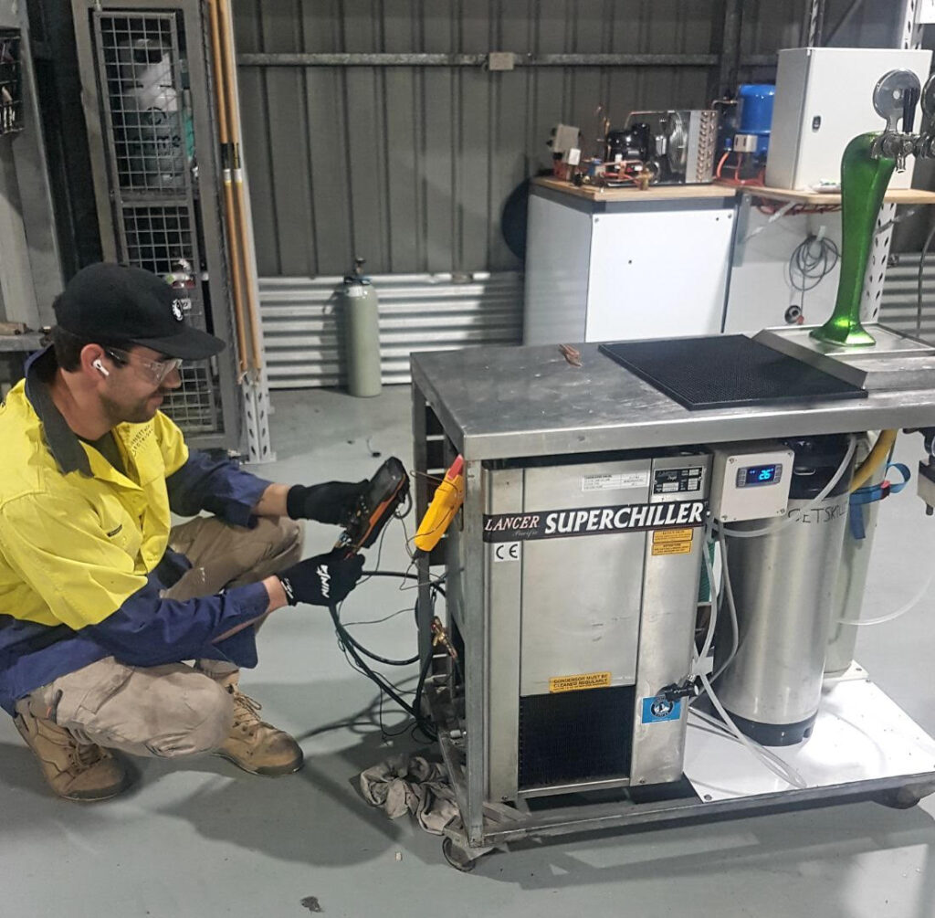 Working on a beverage dispenser - Get Skilled Training