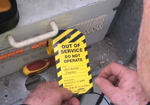 Out of service tag on switchboard | Featured Image for Electrical Training Courses | Electrical RTO & Training for Electricians by Get Skilled Training