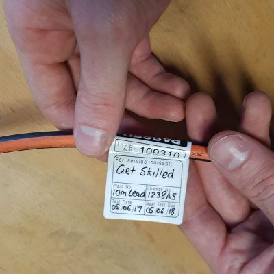Phot of properly tagged electrical cord | Featured image for Test and Tag Training Course page for Get Skilled Training.