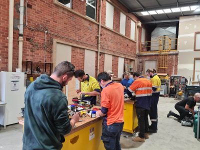 Group of students working on the work benches