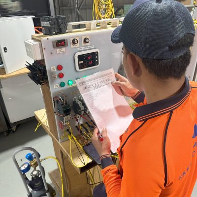 Man reading instructions of electrical course